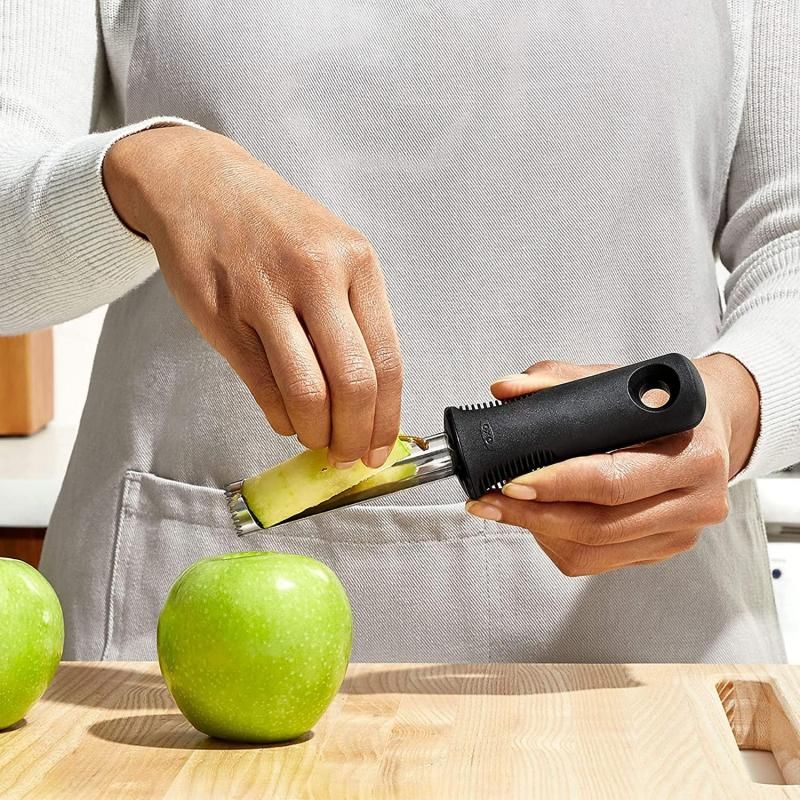 Stainless steel OXO Good Grips Corer with soft nonslip handle, ideal for effortless apple and pear core removal.