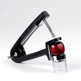 OXO Good Grips Cherry & Olive Pitter with removable splatter shield, ergonomic handles, and compact design for mess-free fruit pitting.