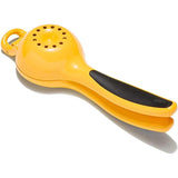 Close-up of OXO Good Grips Citrus Squeezer showcasing its non-stick finish and ergonomic handles for effortless juicing.