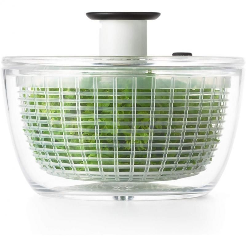 Compact OXO Good Grips Little Salad & Herb Spinner with one-handed operation and non-slip base for easy and efficient drying.