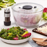 OXO Good Grips Salad Spinner 4.0 with pump mechanism for easy one-handed operation, 6.22 qt capacity, and elegant clear bowl.