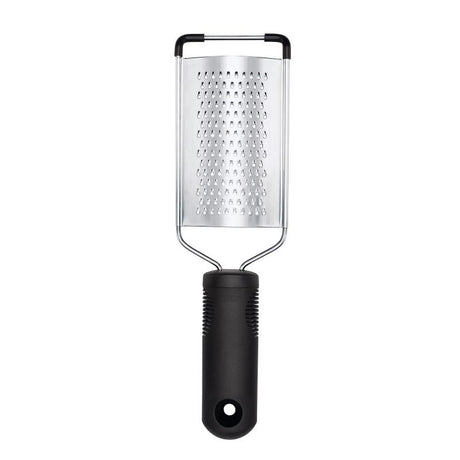 Compact OXO Good Grips Grater with sharp stainless-steel blades and ergonomic nonslip handle for effortless food prep.