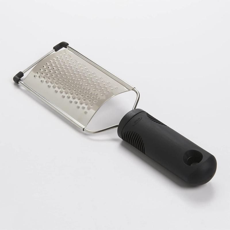 A versatile OXO Good Grips Grater with sharp stainless-steel blades and a soft, nonslip handle for comfortable food prep.