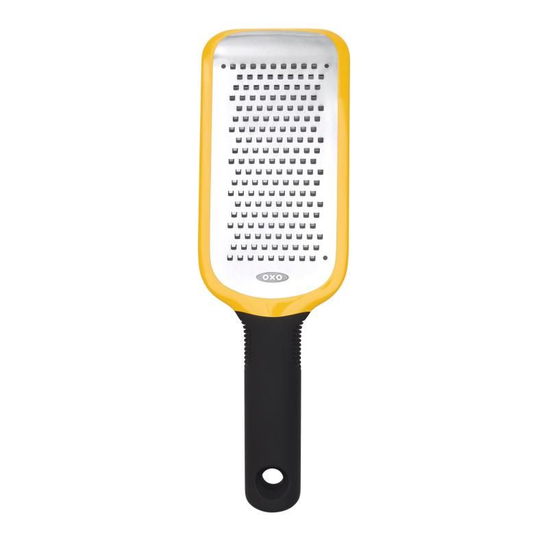 High-quality OXO Good Grips Etched Medium Grater features a sharp steel surface, non-slip feet, and a comfortable handle for easy grating.