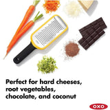 OXO Good Grips Etched Medium Grater with sharp stainless steel surface, non-slip feet, and comfortable grip for easy grating.