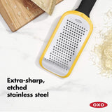 Image of OXO Good Grips Etched Medium Grater featuring sharp etched stainless steel surface, non-slip feet, and soft grip handle.