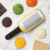 OXO Good Grips Etched Medium Grater with sharp stainless steel surface, non-slip feet, and soft handle for effortless grating.