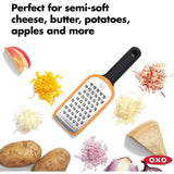 OXO Good Grips Etched Coarse Grater with ergonomic handle and protective cover, perfect for grating cheese, vegetables, and more.