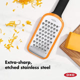 OXO Good Grips Etched Coarse Grater with ergonomic handle and non-slip feet for easy grating of cheese, vegetables, and fruits.