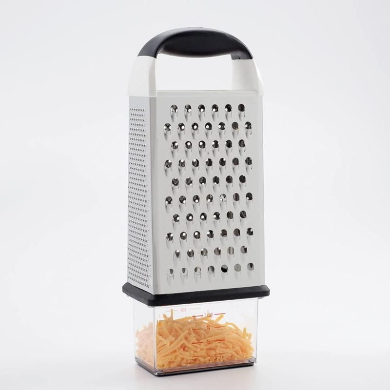 Stainless steel OXO Good Grip Box Grater with four grating surfaces and a storage container for easy food prep.