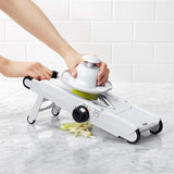 OXO Good Grips V-Blade Mandoline Slicer with adjustable thickness and V-shaped blade for versatile, effortless slicing.