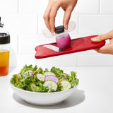 OXO Good Grips Complete Grate & Slicer Set with interchangeable surfaces for grating and slicing, featuring a comfort grip and safety holder.