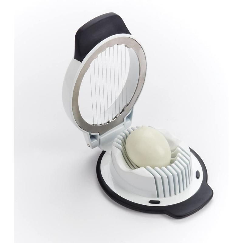 "OXO Good Grips Egg Slicer for uniform hard-boiled egg slices, featuring a non-slip base and dishwasher-safe design."