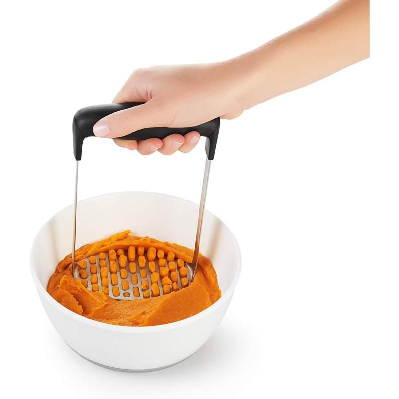 OXO Good Grips Smooth Potato Masher features an ergonomic handle and fine-grid plate for lump-free mashed potatoes effortlessly.