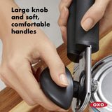 OXO Good Grips Soft-Handled Can Opener with cushioned handles, oversized knob, and built-in bottle opener for easy can opening.