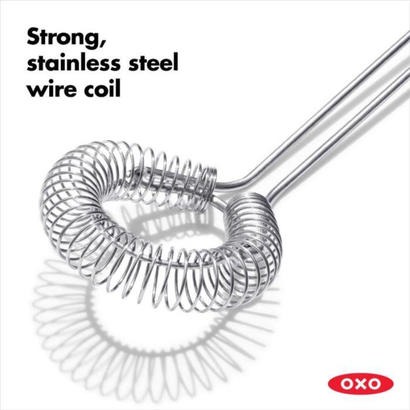 OXO Good Grips Sauce & Gravy Whisk with angled head, non-slip handle, and stainless steel for effortless whisking and mixing.