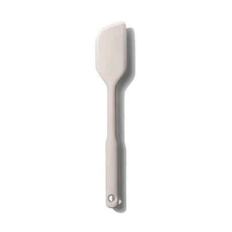 OXO Good Grips Medium Spatula in Oat with silicone head, non-slip handle, heat-resistant, perfect for cooking and baking.