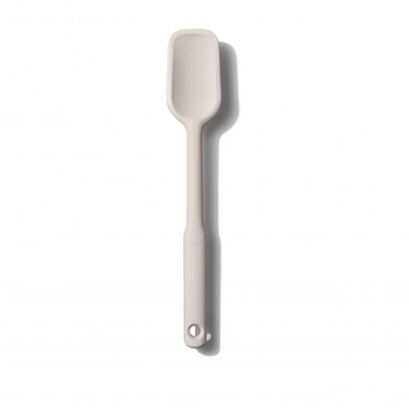 OXO Good Grips Spoon Spatula in Oat, featuring flexible edges, heat-resistant silicone, and a comfortable non-slip grip.