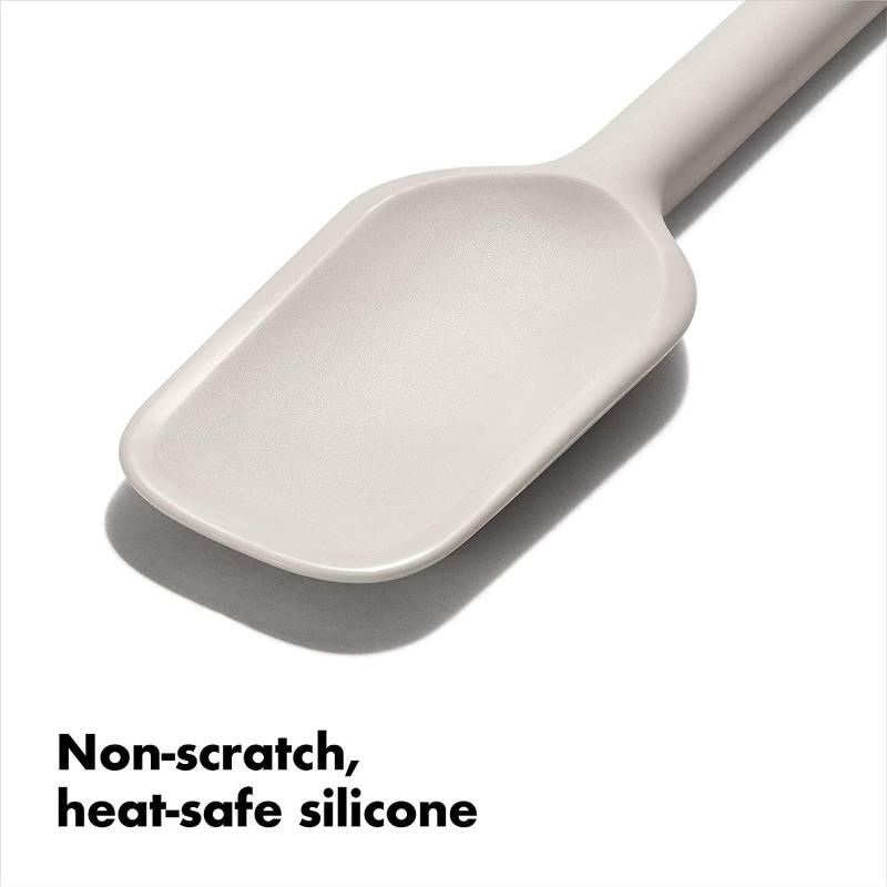 OXO Good Grips Spoon Spatula in Oat, 30cm, features flexible edges, non-slip grip, and heat-resistant silicone for versatile cooking.