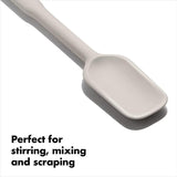 OXO Good Grips Spoon Spatula in Oat, featuring flexible edges and a non-slip grip, perfect for stirring and scraping.