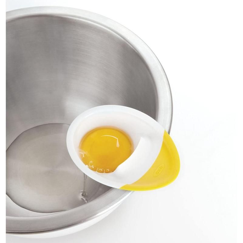 OXO Good Grips 3-IN-1 Egg Separator for easy egg cracking and separating without mess, compatible with all bowl types.