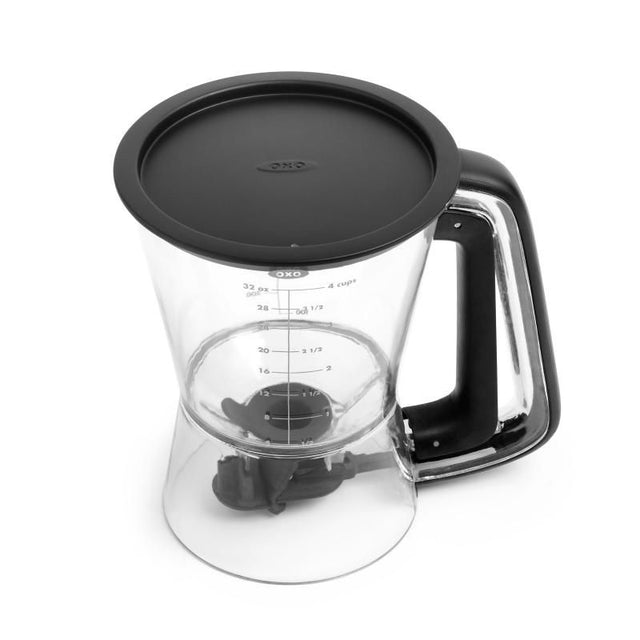 Clear batter dispenser with easy-squeeze handle, precise shut-off valve, and measurement markings for mess-free baking.