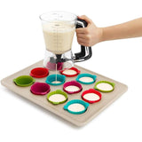 Clear batter dispenser with easy-squeeze handle, measurement markings, and drip-free valve for mess-free baking.