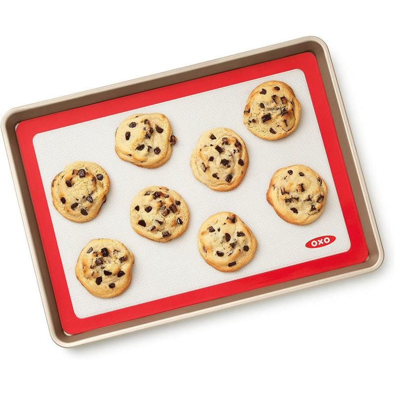 OXO Good Grips Silicone Baking Mat in White, reusable, non-stick, 11.5"x16.5", perfect for half-sheet pans, easy cleanup.