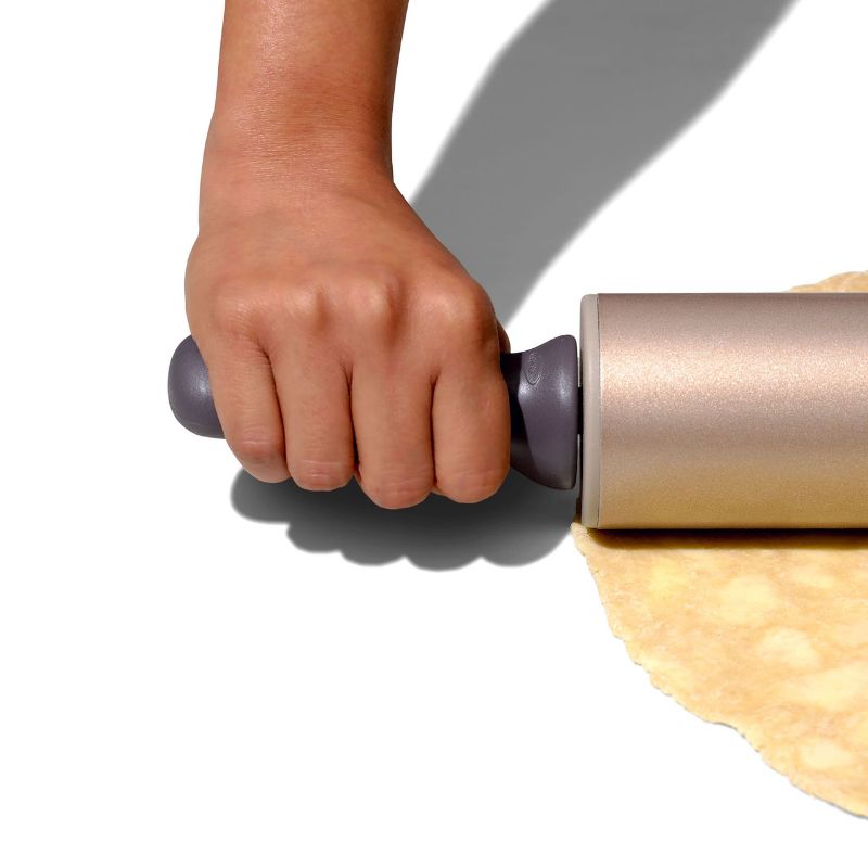 OXO Good Grips Non-Stick Rolling Pin with contoured handles, 12-inch length, metal design for easy baking tasks and cleanup.