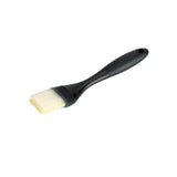 Silicone pastry brush with multi-layered bristles for precise application of sauces; heat resistant and dishwasher safe.