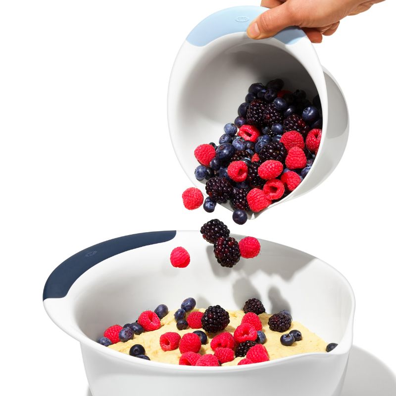 OXO 3-Piece Mixing Bowl Set with non-slip handles, non-skid bottoms, and spouts for easy, mess-free pouring.