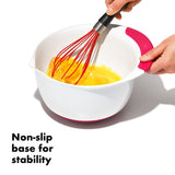 Set of three OXO mixing bowls in various sizes with non-slip handles and spouts for easy pouring and stable mixing.