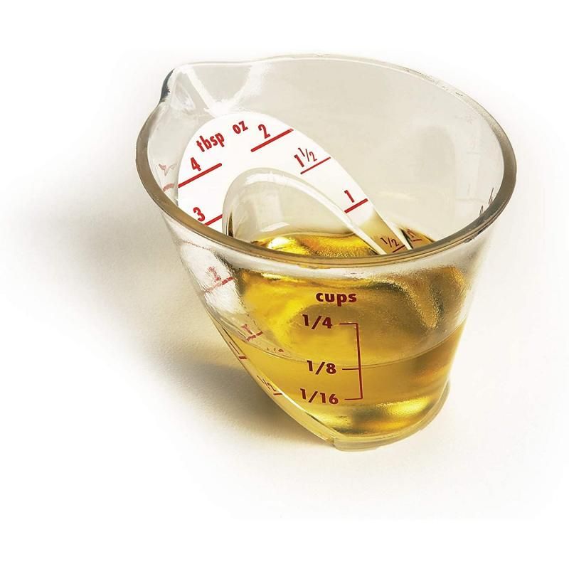 Mini OXO Good Grips Angled Measuring Cup with easy-to-read markings for precise measuring of liquids and dry ingredients.