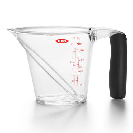 Angled measuring cup with easy-to-read markings and a non-slip handle for accurate liquid measurements.