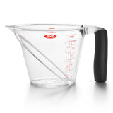 Clear view of OXO Good Grips Angled Measure Cup with measurement markings, non-slip handle, and pouring spout, ideal for cooking.