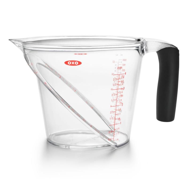 Angled measuring cup with clear markings for easy reading and ergonomic handle, ideal for precise liquid measurements.