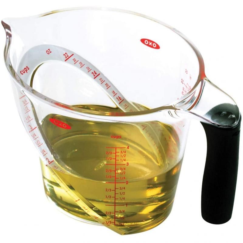 Clear, 4-cup measuring cup with angled design for easy reading, ergonomic handle, and dishwasher safe for effortless cleanup.