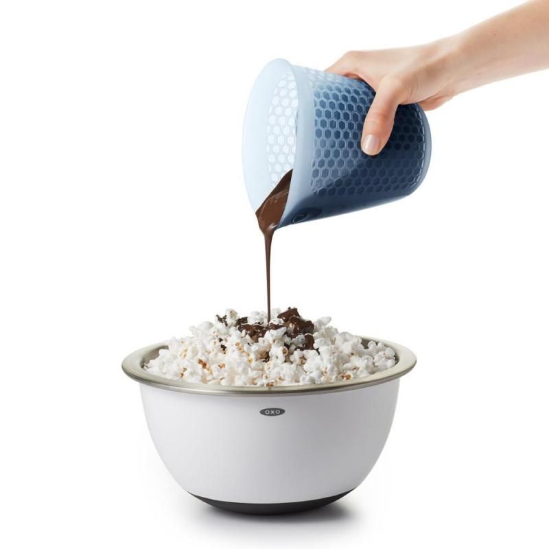 OXO Good Grips 1 Cup Squeeze & Pour Silicone Measuring Cup with heat-dissipating honeycomb pattern for safe, precise pouring.