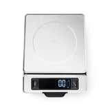 Stainless steel food scale with pull-out display, weighing up to 11 lb/5 kg for precise cooking and baking measurements.