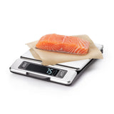 Stainless steel food scale with pull-out display, precise weighing up to 11 lbs, ideal for cooking and baking.