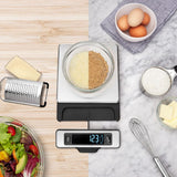 OXO 11 lb stainless steel food scale with pull-out display, perfect for precise measuring and easy reading with large bowls.