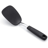 OXO Good Grips Nylon Flexible Turner: 11-inch heat-resistant tool for flipping delicate foods, safe for nonstick cookware.