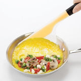 Large OXO Good Grips Flip & Fold Omelet Turner with flexible head and non-slip handle for easy flipping of omelets and quesadillas.