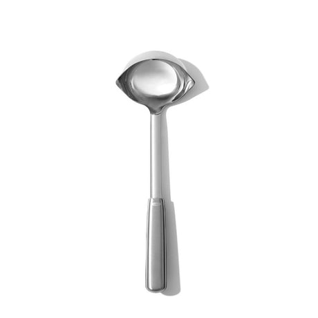 OXO Steel Ladle with angled head and dual pour spouts, crafted from durable stainless steel for effortless serving and cleanup.