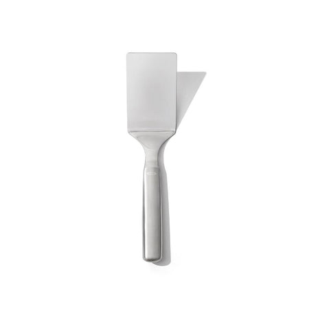 Stainless steel OXO Lasagna Turner with angled, flexible head for effortless serving of lasagna, quiche, and more.