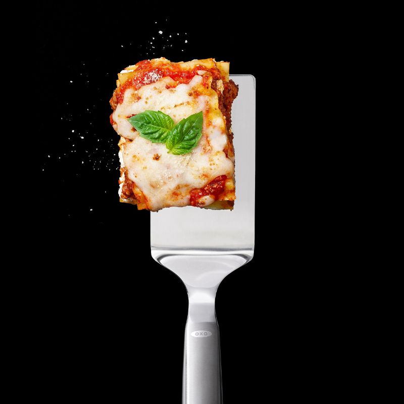 Stainless steel lasagna turner with an angled head for easy serving of lasagna, quiche, and more; dishwasher safe.