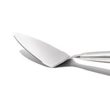 OXO Steel Pie Server with serrated edges and flexible head for easy serving of pies, cakes, and quiches; dishwasher safe.