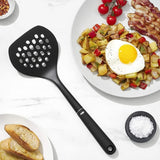 OVO Good Grips Nylon Round Turner with a broad surface, heat-resistant, non-slip grip, perfect for flipping pancakes and burgers.