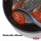 Versatile OXO Good Grips Silicone Spoon with soft grip, high heat resistance, perfect for non-stick cookware and easy cleanup.