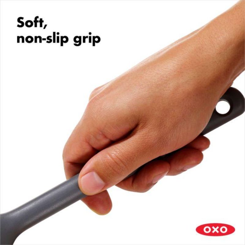 OXO Good Grips Silicone Turner with flexible edges, heat-resistant silicone, and non-slip grip for comfortable cooking.